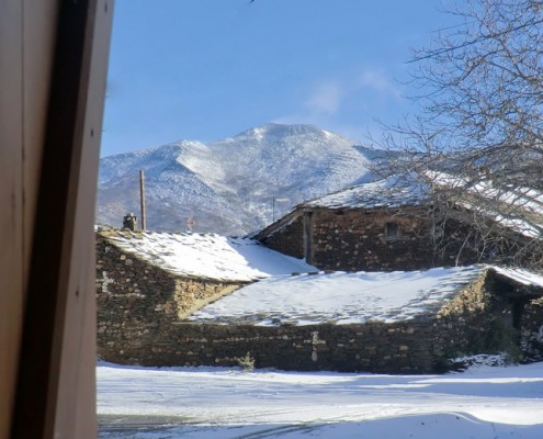 Casas de El Espinar y Ocejón nevado